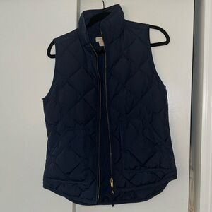 Like new Jcrew women’s vest. Navy blue with gold zipper details. XS.